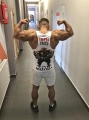 Biały tank top męski Trening Czyni Mistrza